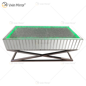 Venda imperdível WXF-582 Móveis de diamante esmagado prata com suporte de aço inoxidável com alto-falante e mesa de centro LED azul dente